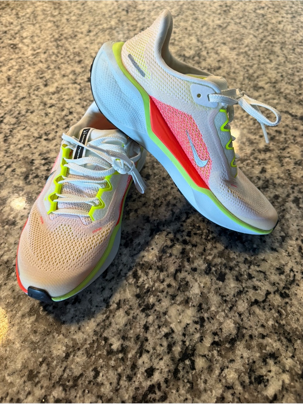 Nike White Running Shoes with Neon Green and Coral Details